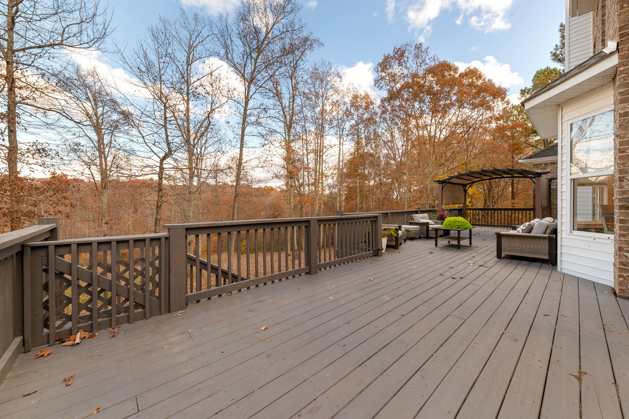 5061 Spears Road Centerville, TN 37033 - Photo 21 of 55 a view of a balcony with wooden floor and fence