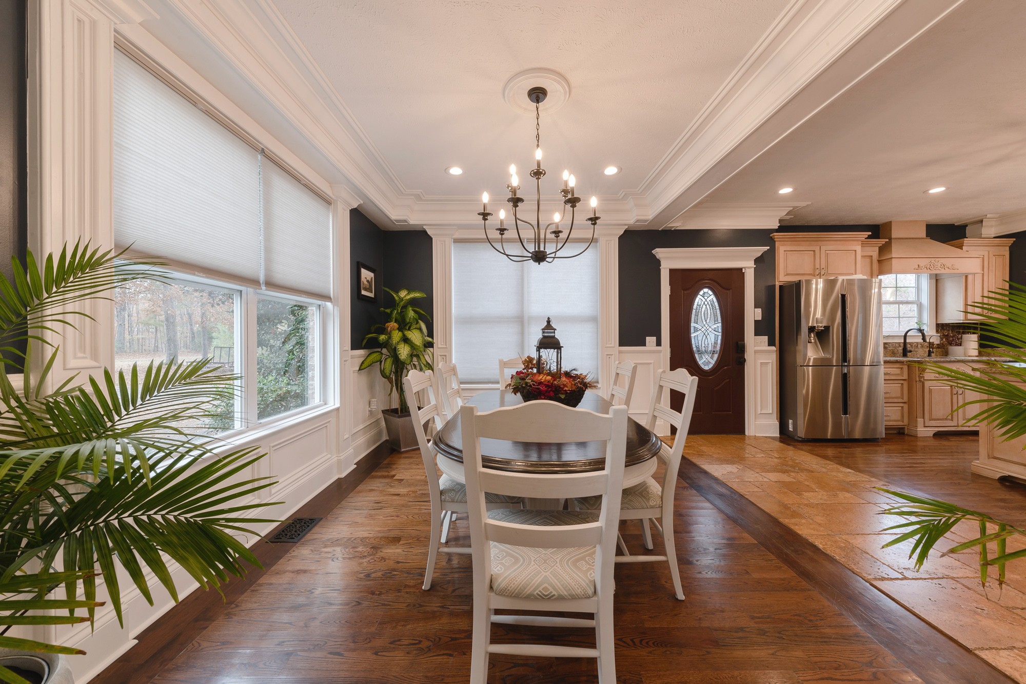 5061 Spears Road Centerville, TN 37033 - Photo 26 of 55 a dining room with furniture a chandelier and wooden floor