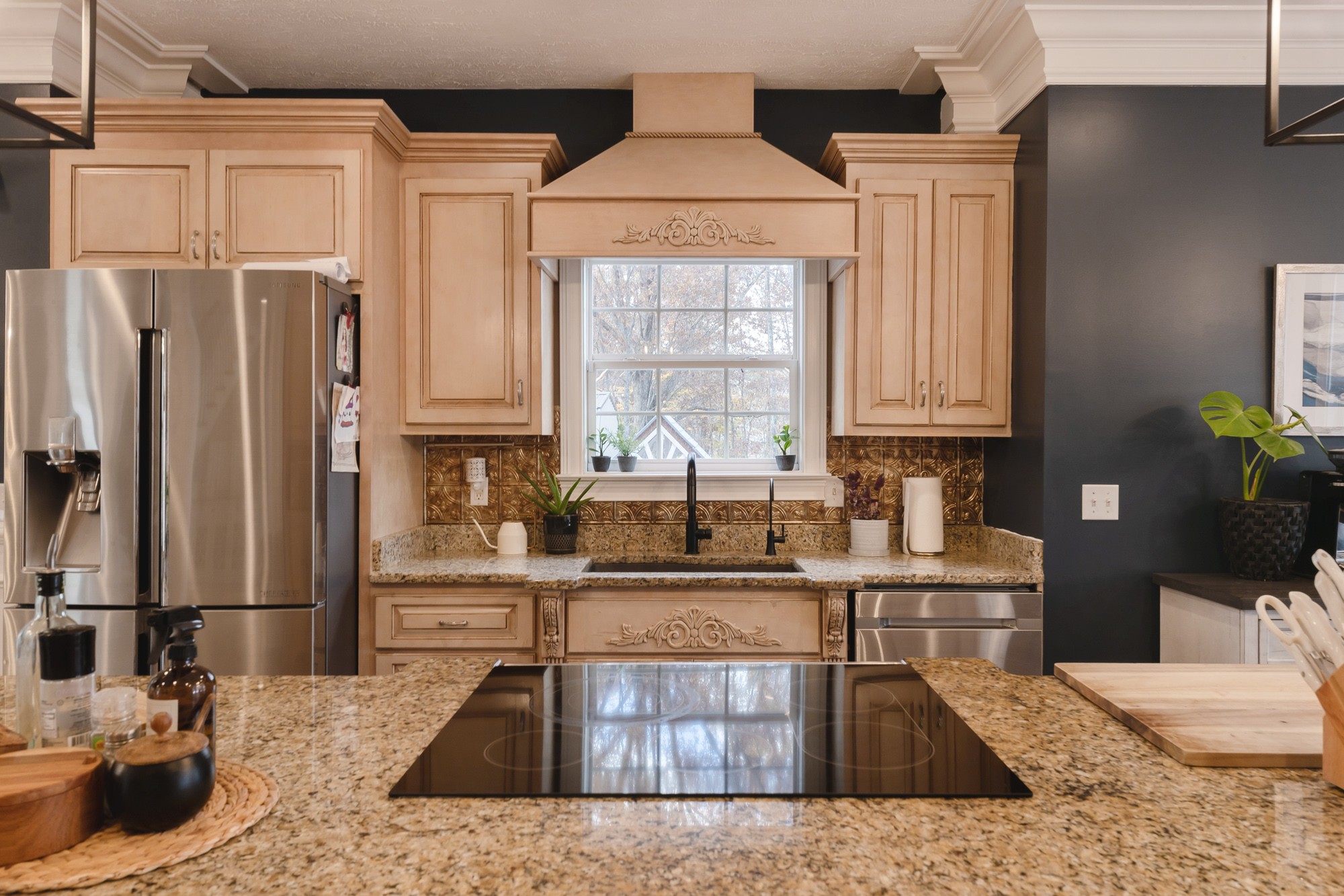 5061 Spears Road Centerville, TN 37033 - Photo 31 of 55 a kitchen with stainless steel appliances granite countertop a sink stove and refrigerator