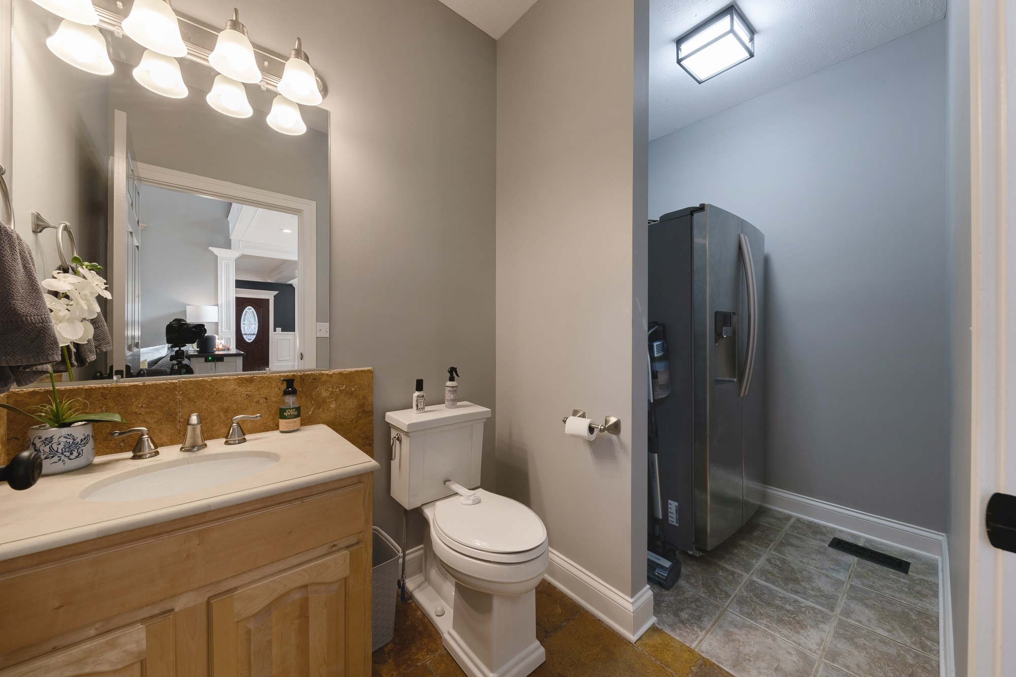 5061 Spears Road Centerville, TN 37033 - Photo 39 of 55 a bathroom with a toilet sink and mirror