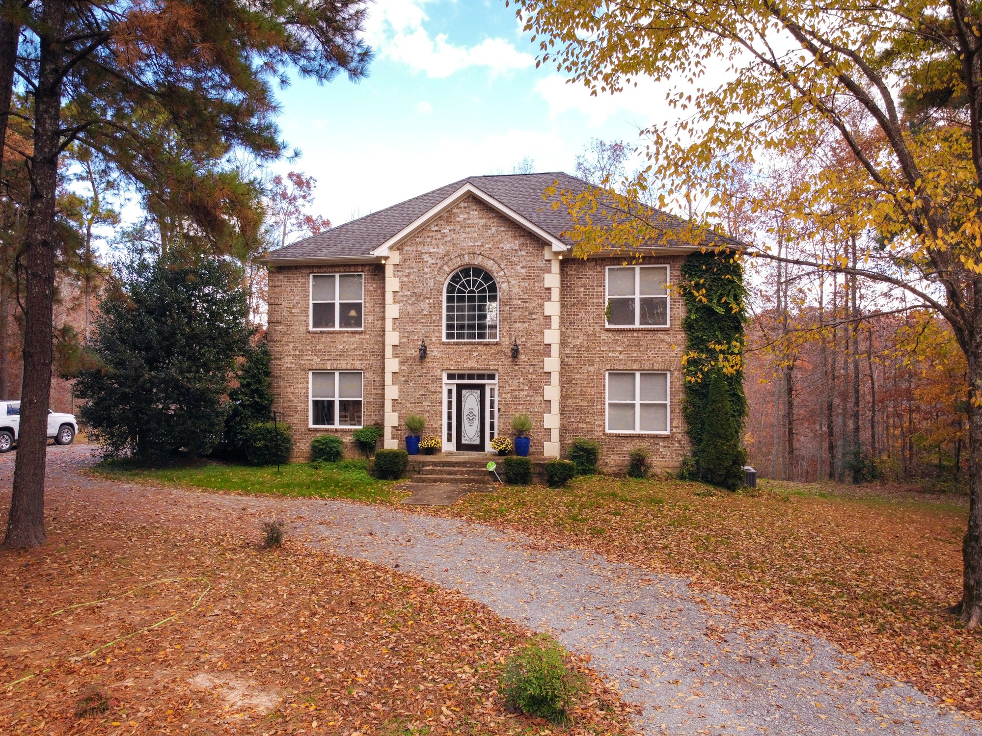 5061 Spears Road Centerville, TN 37033 - Photo 5 of 55 a front view of a house with a yard