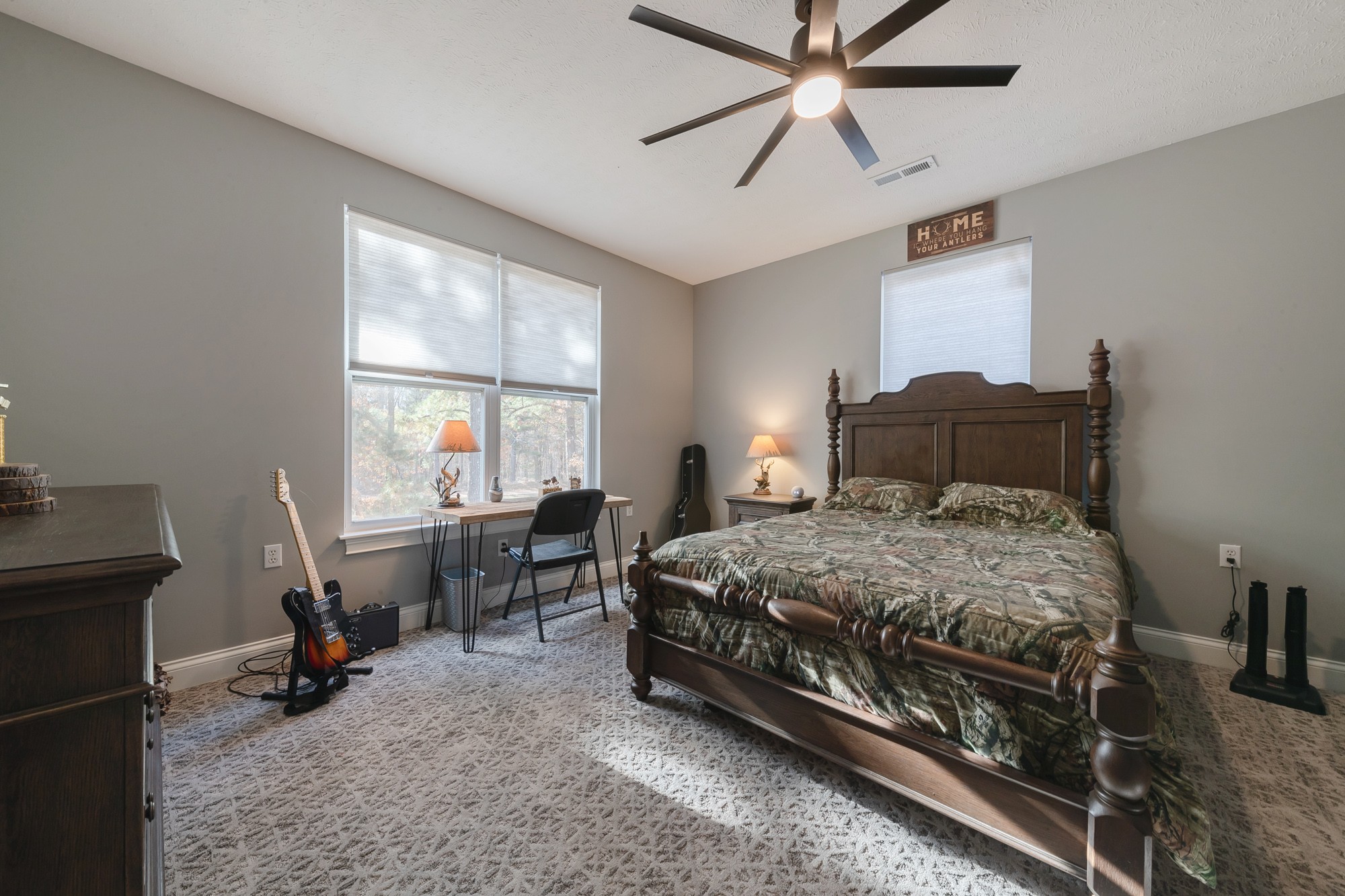 5061 Spears Road Centerville, TN 37033 - Photo 47 of 55 a bedroom with a bed a table and a large window