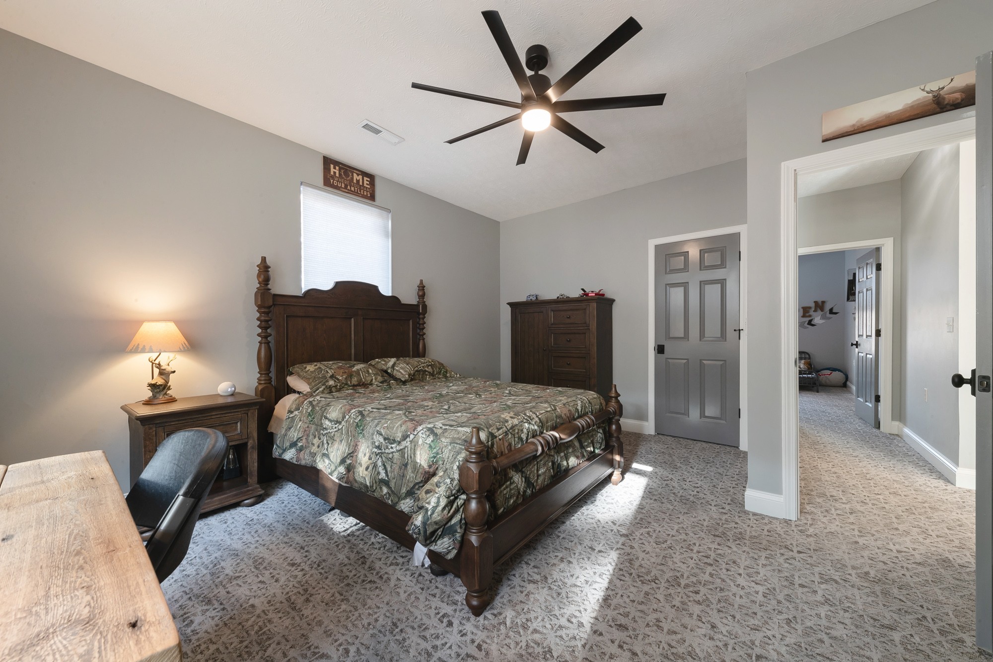 5061 Spears Road Centerville, TN 37033 - Photo 48 of 55 a bedroom with a bed and a chandelier