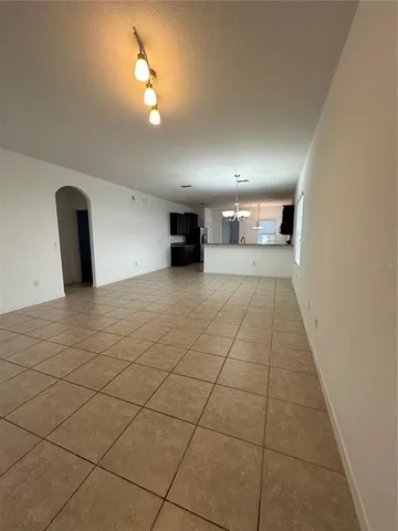 a view of a livingroom with a staircase