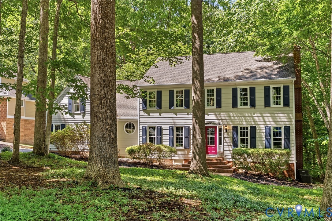 14321 Crossings Ridge Drive Midlothian, VA 23113 - Photo 1 of 43 front view of a house with a yard