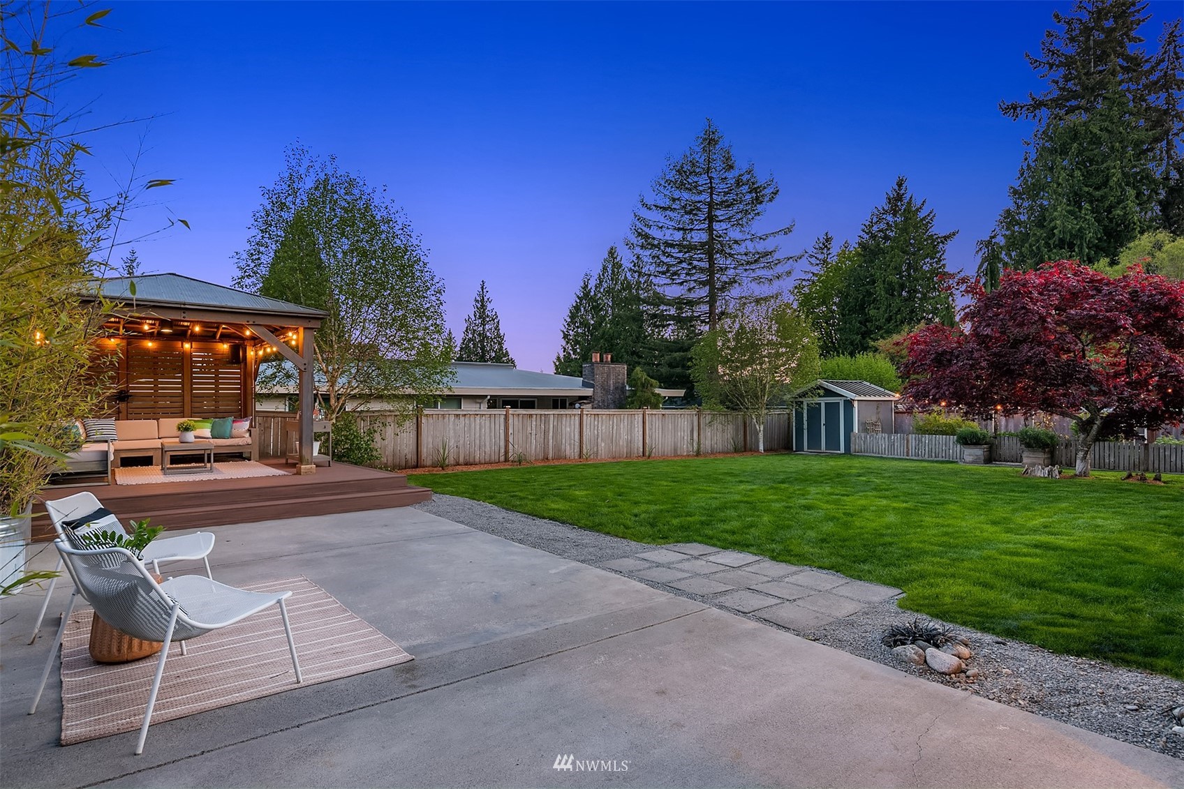 14217 Southeast 144th Street Renton, WA 98059 - Photo 20 of 30 a view of backyard with outdoor seating and green space