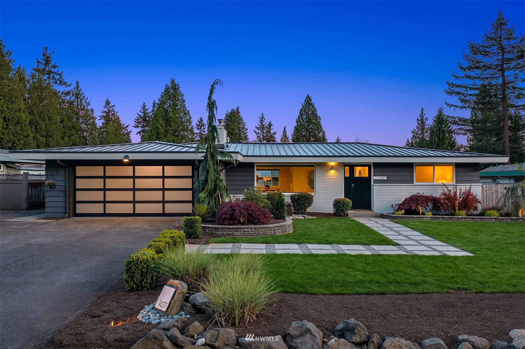 14217 Southeast 144th Street Renton, WA 98059 - Photo 28 of 30 front view of a house with a yard