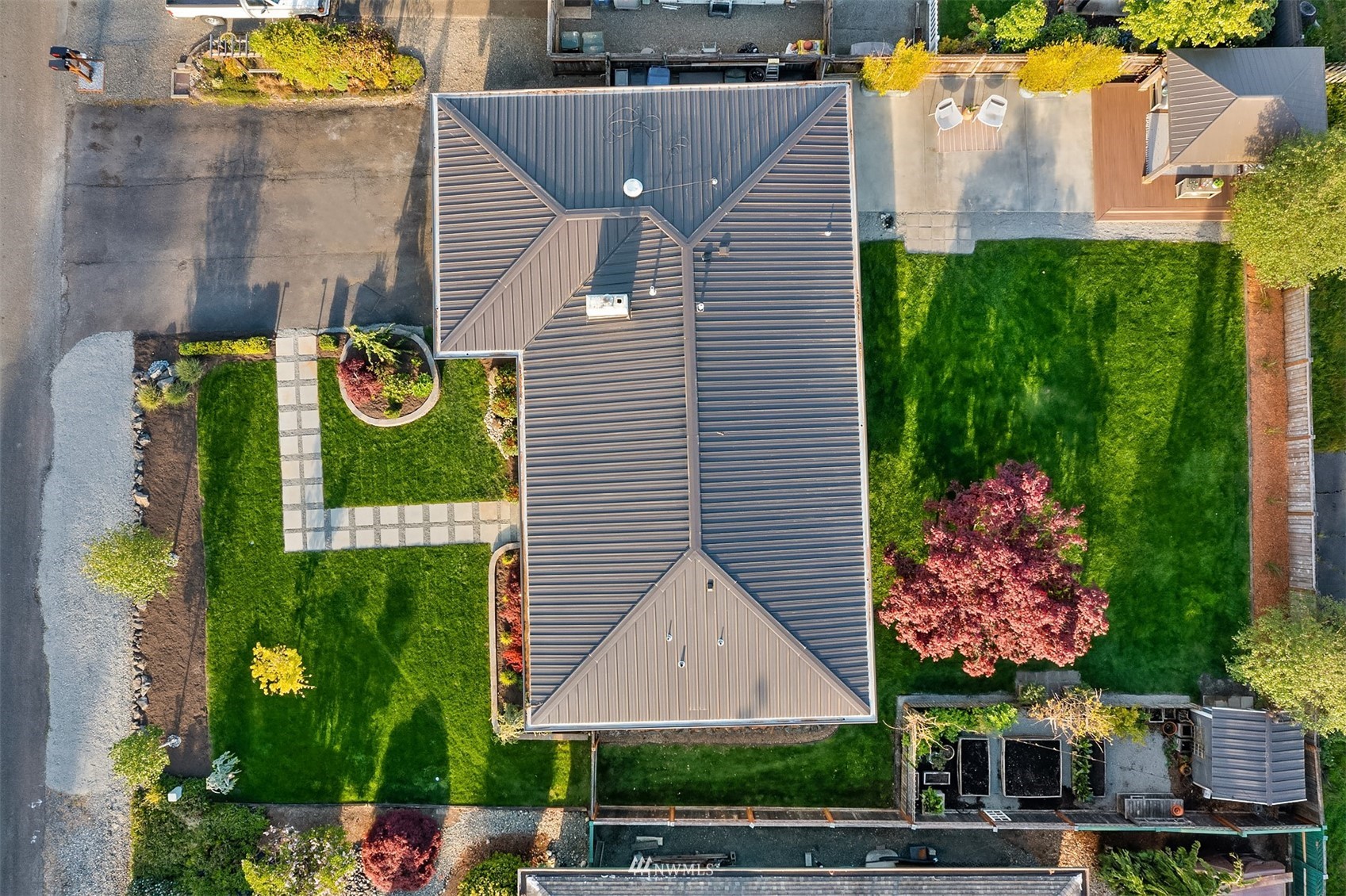 14217 Southeast 144th Street Renton, WA 98059 - Photo 29 of 30 a aerial view of a house with swimming pool and large trees