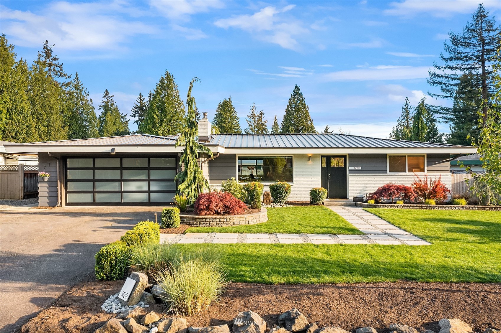 14217 Southeast 144th Street Renton, WA 98059 - Photo 30 of 30 front view of a house with a yard