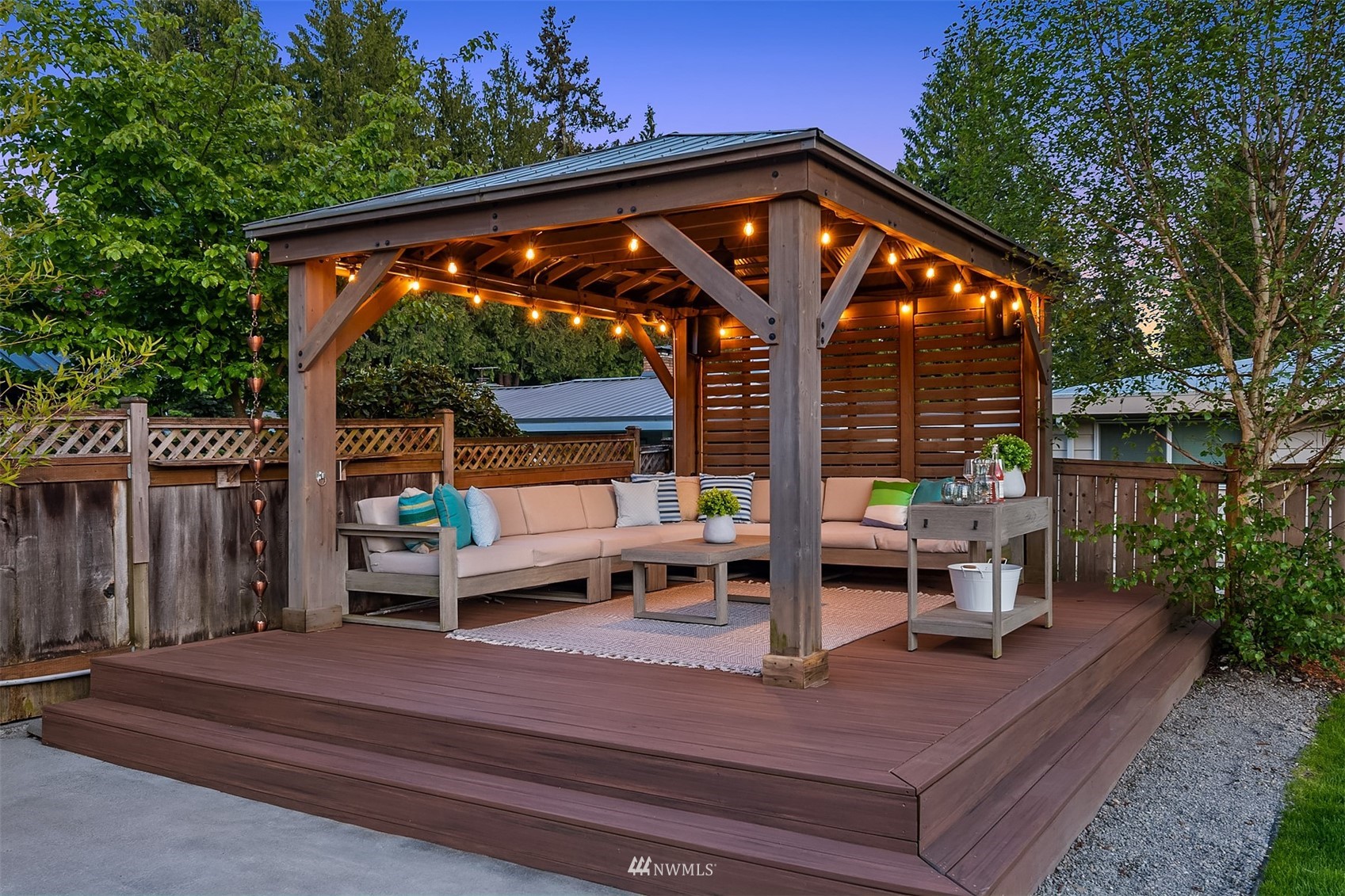 14217 Southeast 144th Street Renton, WA 98059 - Photo 4 of 30 a view of sitting area with furniture and wooden deck