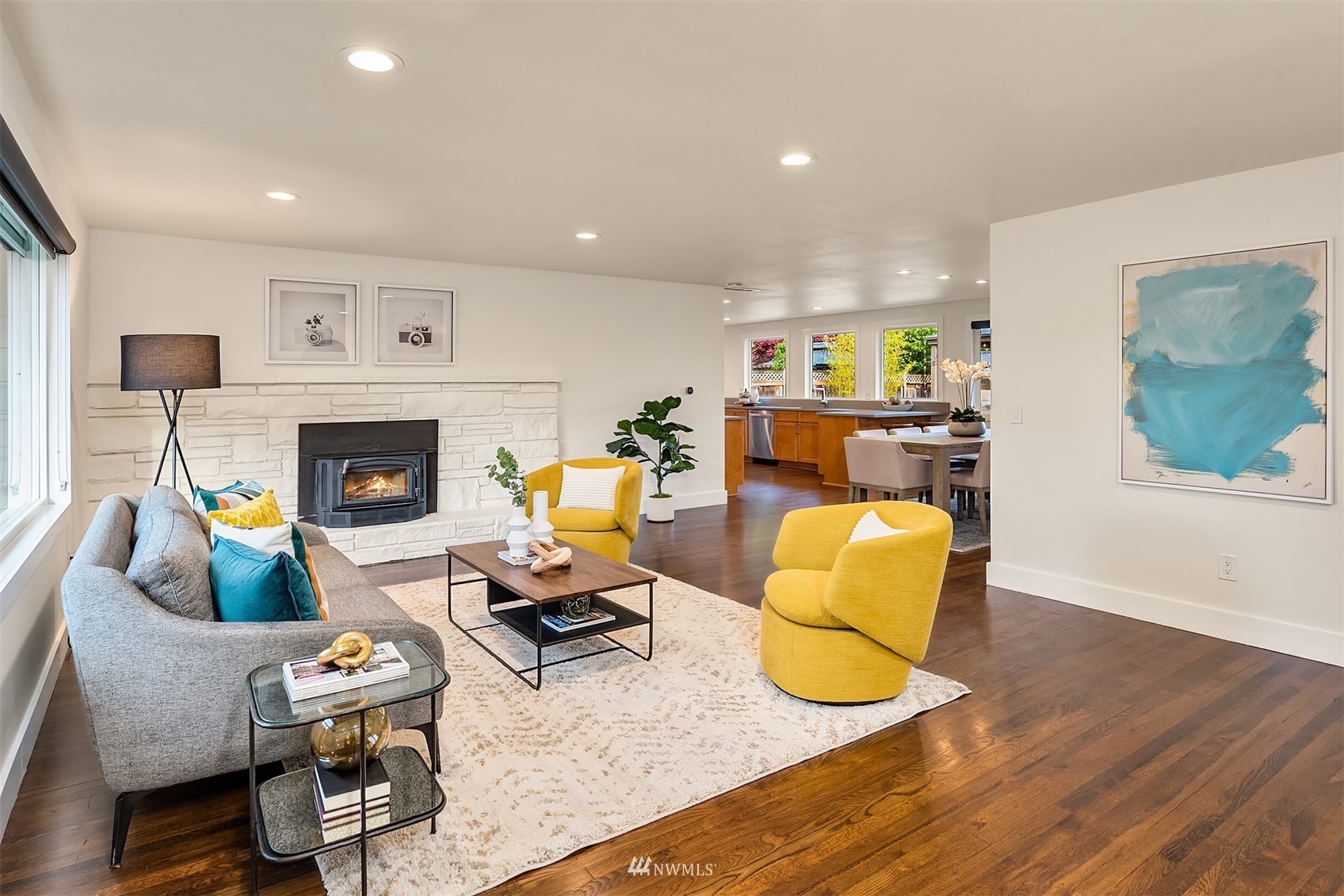 14217 Southeast 144th Street Renton, WA 98059 - Photo 8 of 30 a living room with furniture and a fireplace