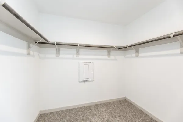 a view of a room with racks on the wall