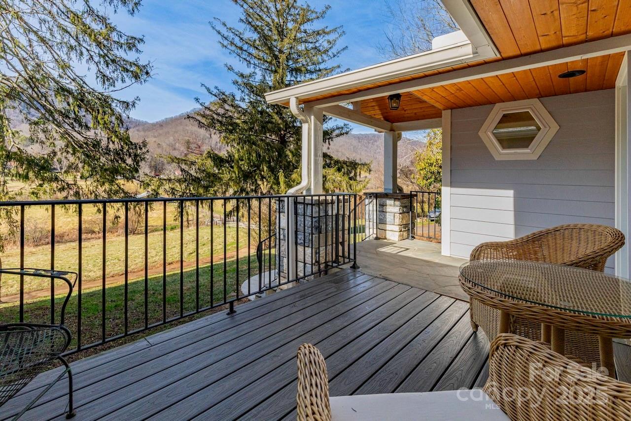 a balcony with wooden floor