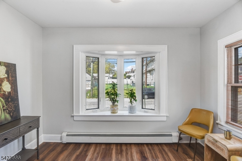 1017 Grandview Avenue Union, NJ 07083 - Photo 12 of 34 a living room with a chair and a window