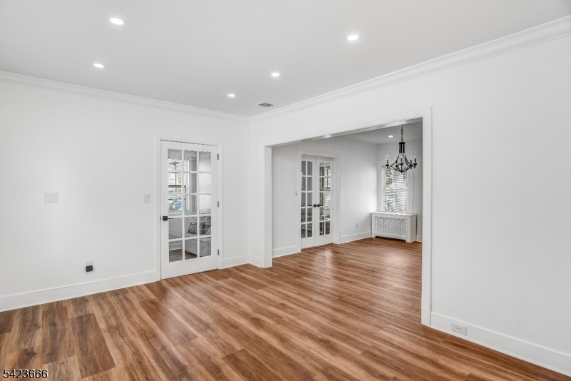 1017 Grandview Avenue Union, NJ 07083 - Photo 24 of 34 a view of an empty room with wooden floor and a window