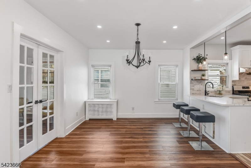 1017 Grandview Avenue Union, NJ 07083 - Photo 8 of 34 a view of a room with wooden floor and windows
