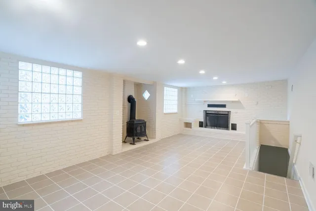 a view of a kitchen with a sink and a window