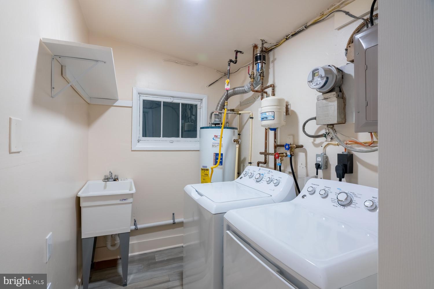7313 Dooman Road Baltimore, MD 21244 - Photo 20 of 35 a bathroom with a sink vanity and a mirror