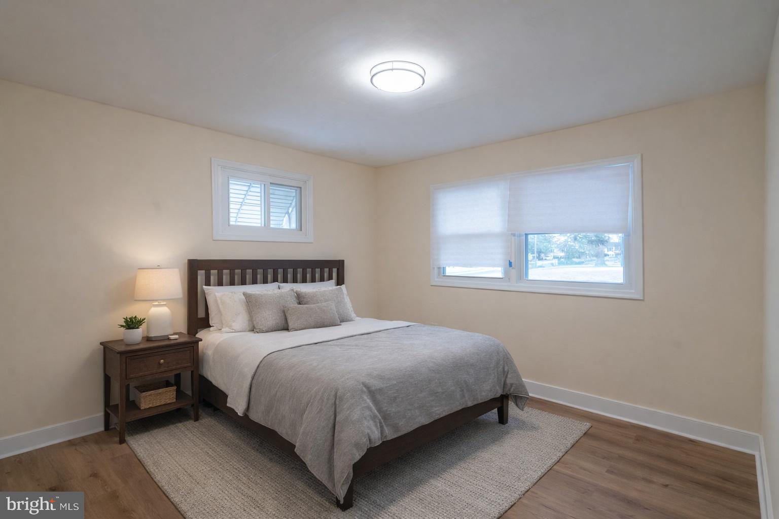 7313 Dooman Road Baltimore, MD 21244 - Photo 24 of 35 a bedroom with a bed and a window