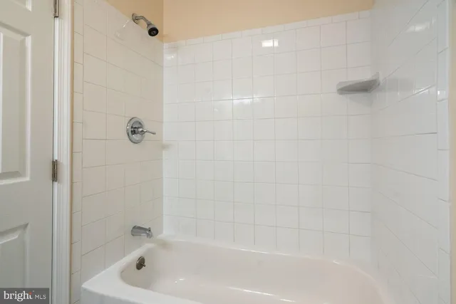 a bathroom with a bathtub