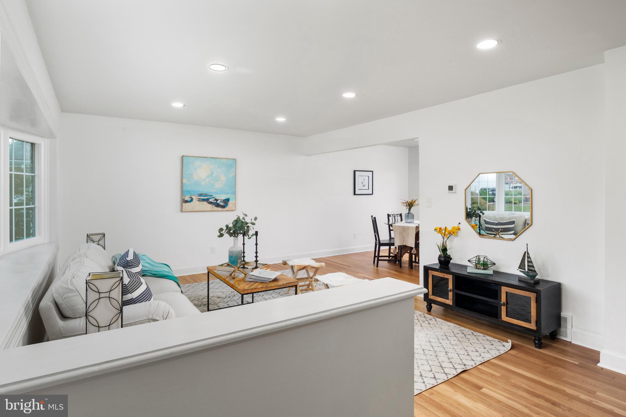 8921 Parlo Road Nottingham, MD 21236 - Photo 6 of 40 a living room with furniture and a wooden floor