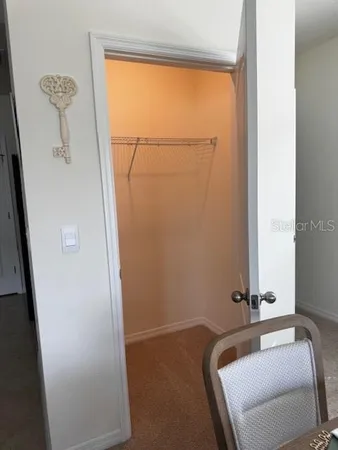 a room with a bed and a window