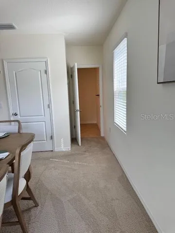 a view of livingroom with furniture and window