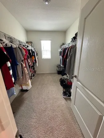 a view of a room with a window