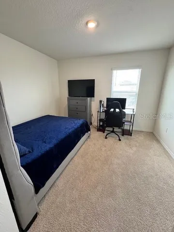a bathroom with a double vanity sink toilet and shower