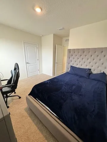 a bathroom with a sink toilet and mirror