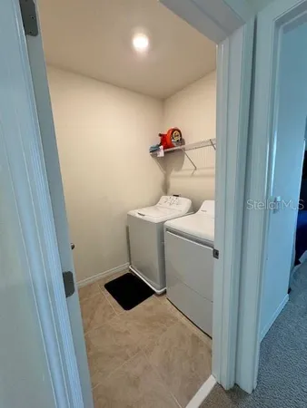 a front view of a building with parking