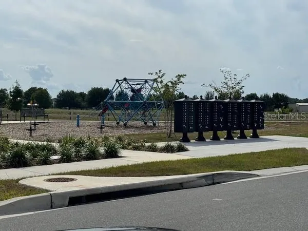a view of swimming pool with a garden
