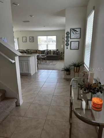 a kitchen with granite countertop a sink and a stove