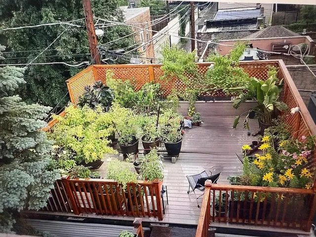a view of a car park in front of house