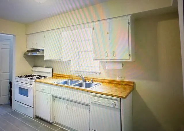 a workspace with furniture and window