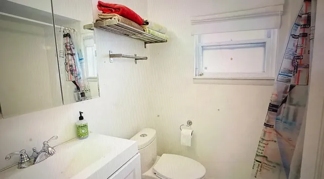 a view of a living room with furniture