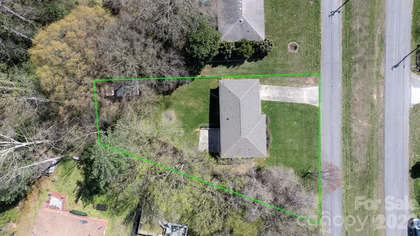 an aerial view of a house with balcony