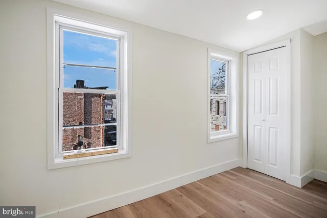 an empty room with windows