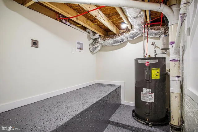 a view of staircase with white walls