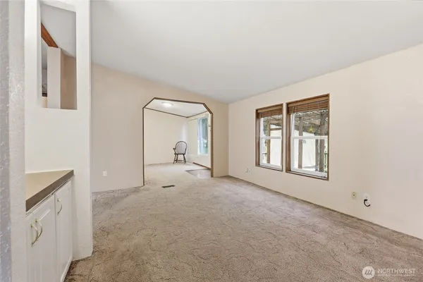 a view of empty room with front door