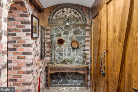 a view of a balcony with wooden floor