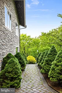a kitchen with a table and chairs in it