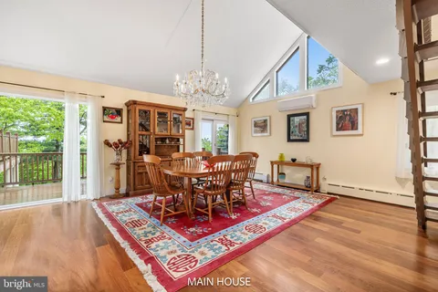 a view of a fireplace with wooden floor