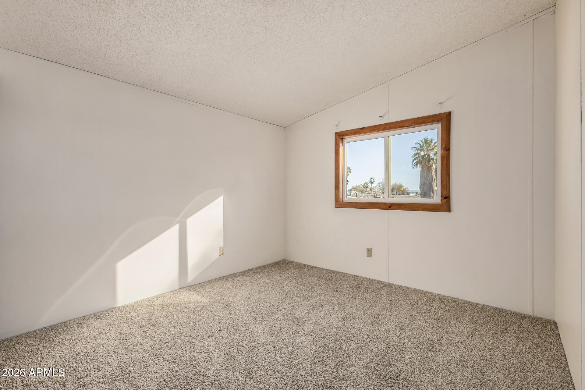 4184 Palm Lane Coolidge, AZ 85128 - Photo 18 of 47 an empty room with a window