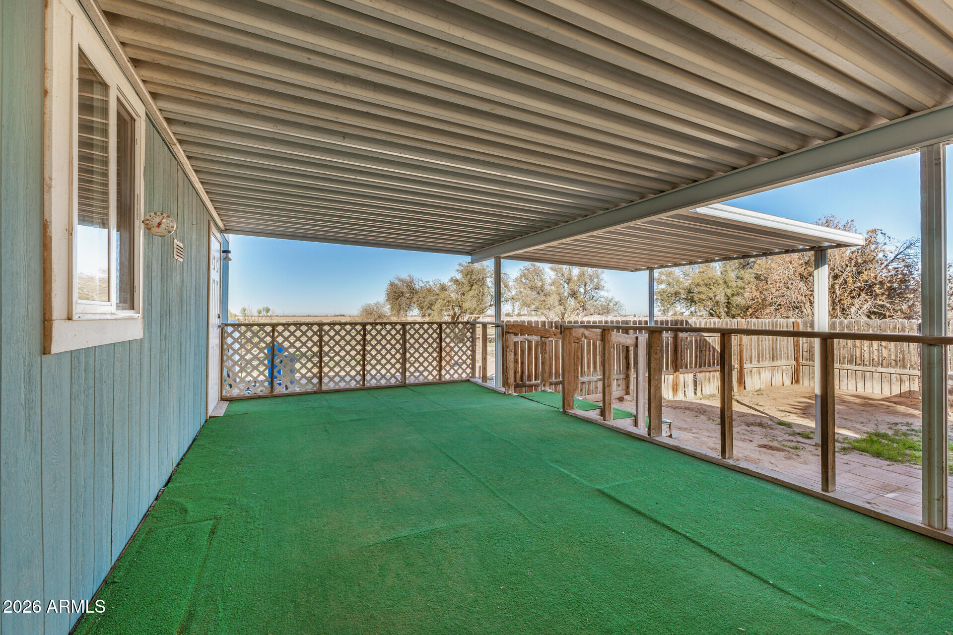 4184 Palm Lane Coolidge, AZ 85128 - Photo 27 of 47 a view of yard with wooden fence