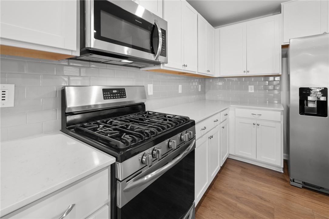 520 Brasstown Court Pendleton, SC 29670 - Photo 6 of 29 This sleek kitchen features modern appliances and ample counter space for culinary pursuits.