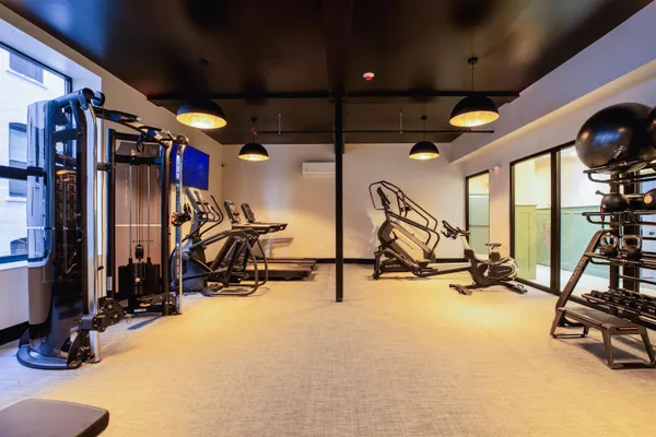 a view of a room with gym equipment