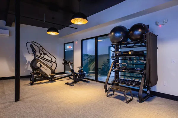 a view of a room with gym equipment