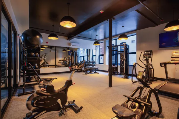 a view of a room with gym equipment