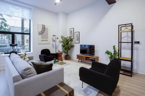 a living room with furniture or window and a fireplace